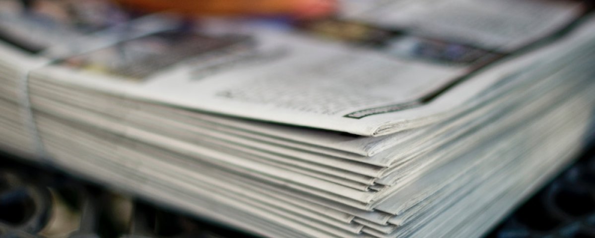 newspaper on table default story image