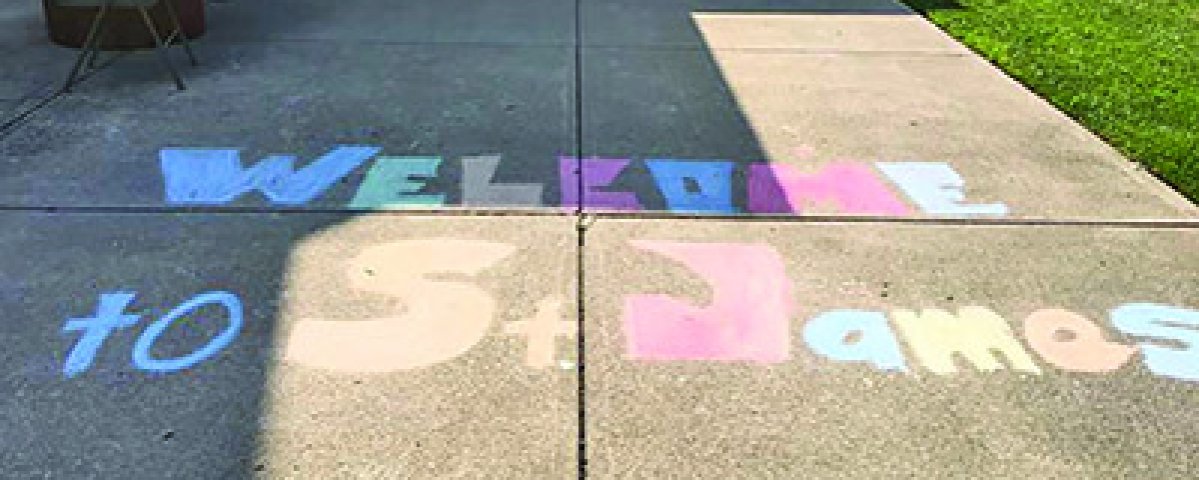 A chalk drawing on the sidewalk welcomed visitors to the concerts