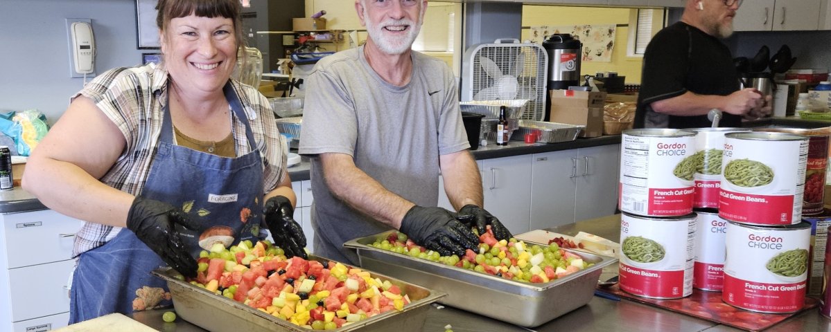 Volunteers prepare a meal in St. Stephen's kitchen