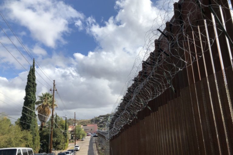 A section of the border wall cuts a line between Nogales, Arizona, and Nogales, Mexico. Photo: Lynette Wilson/Episcopal News Service