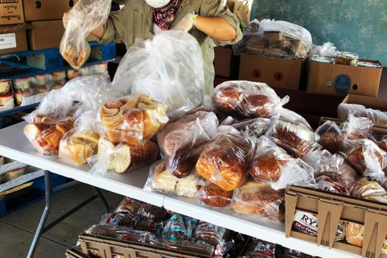 Woman sorts bread