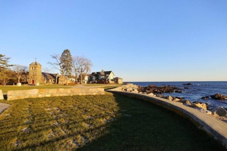 Chapel situated near the Gulf of Maine seen from a distance during sunset