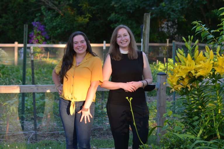 Kristin Talbot, left, the garden manager at St Francis Episcopal Church, and the Rev. Grace Flint at the garden last Saturday. In celebration of Pollinator Week, the garden hosted a series of events to educate the community on how to protect pollinators.