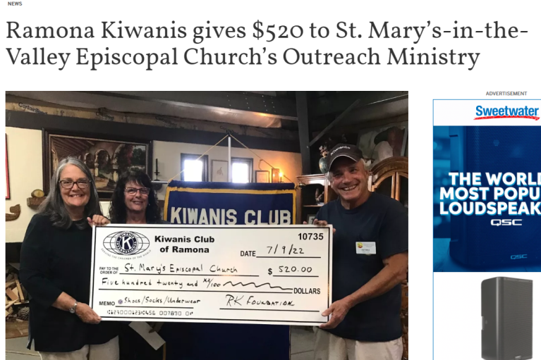 Debbie Benson and Dawn Kezer of St. Mary's accepting a check from Kiwanis.