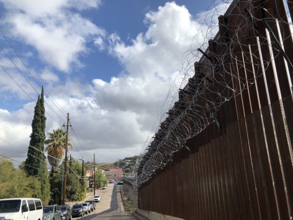 A section of the border wall cuts a line between Nogales, Arizona, and Nogales, Mexico. Photo: Lynette Wilson/Episcopal News Service