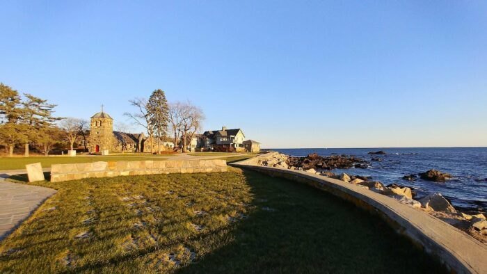 Chapel situated near the Gulf of Maine seen from a distance during sunset