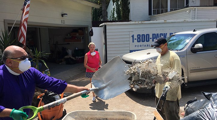 Bishop and communities members assist in community clean up after Hurricane damage