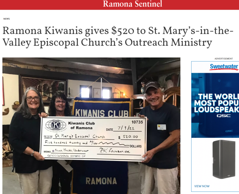 Debbie Benson and Dawn Kezer of St. Mary's accepting a check from Kiwanis.