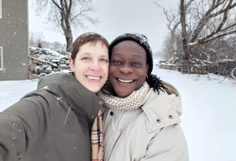 Mother Amy Heimerl and Rev. Dr. Brenda of KARIBU Ministries outside in the snow